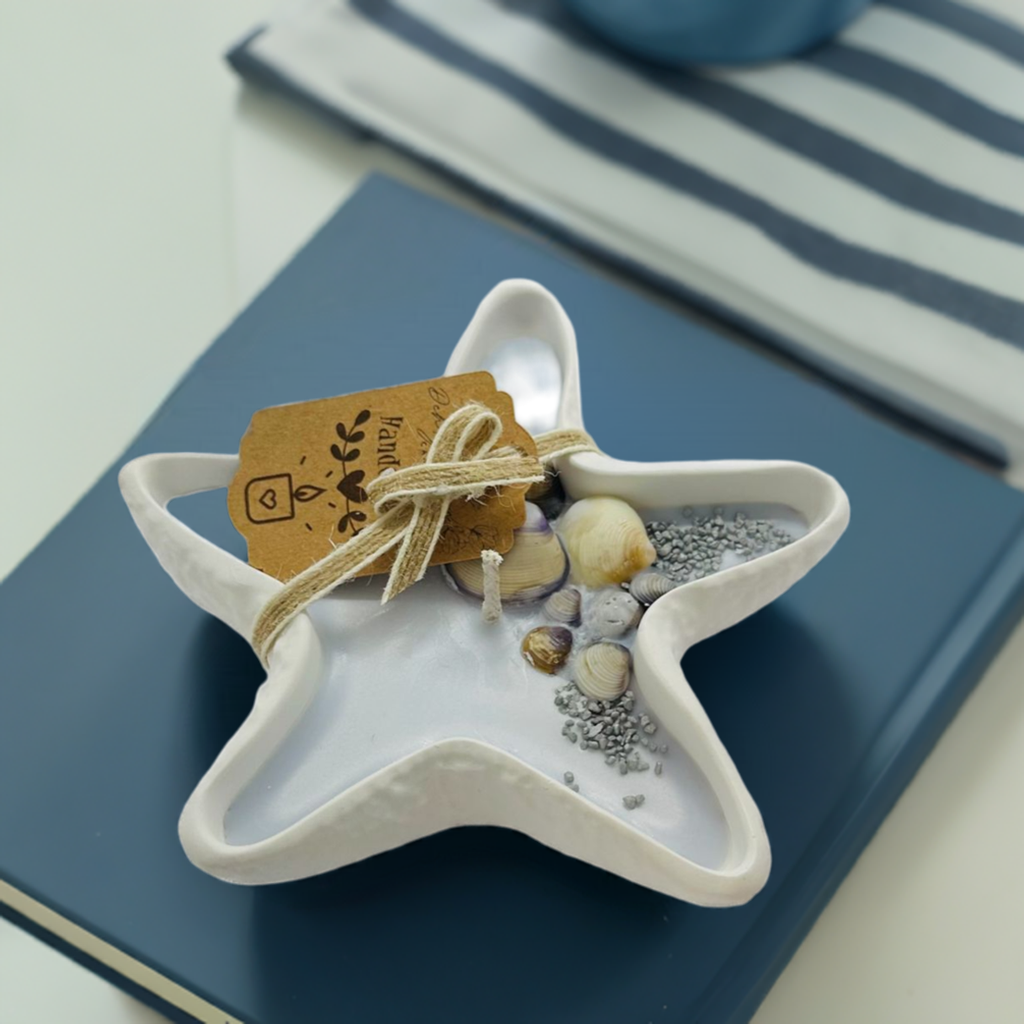 Acquamarine Candela a forma di stella marina con i colori del mare .Bougies, Kerzen